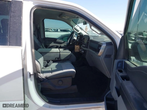 2021 Ford F-150 XL with VIN 1FTFW1E86MFC72651, listed as a IAAI auction lot 41840341 with 100,645 mi miles. Bid and sale history available at carsss.com. Image 5.
