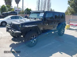 2008 Jeep Wrangler Unlimited Sahara with VIN 1J8GA59168L587554, listed as a IAAI auction lot 41963587 with 189,943 mi miles and . Bid and sale history available at DreamBid. Image 17.