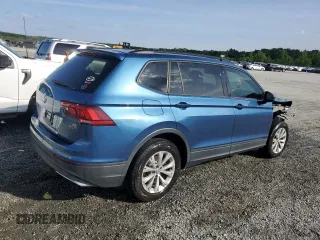 2018 Volkswagen Tiguan S with VIN 3VV0B7AX2JM019924, listed as a Copart auction lot 56138375 with 76,798 mi miles and Salvage title. Bid and sale history available at DreamBid. Image 3.