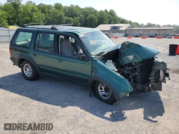 2001 Ford Explorer XLS with VIN 1FMZU72E41ZA71028, listed as a Copart auction lot 59396175 with 200,898 mi miles and Salvage title. Bid and sale history available at DreamBid. Image 4.
