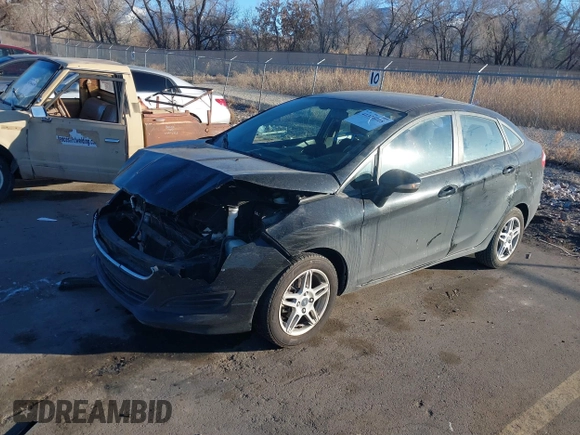 2017 Ford Fiesta SE z VIN 3FADP4BJ6HM125903, wystawiony jako IAAI lot #41376018 z przebiegiem 114 628 mil mil oraz . Historia ofert i sprzedaży dostępna na DreamBid. Obrazek 17.