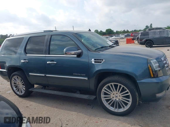 2009 Cadillac Escalade z VIN 1GYFK23249R136552, wystawiony jako IAAI lot #42055626 z przebiegiem 196 234 mil mil oraz . Historia ofert i sprzedaży dostępna na DreamBid. Obrazek 14.