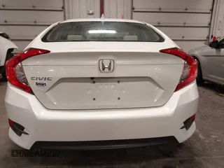 2018 Honda Civic EX with VIN 19XFC2F74JE005647, listed as a IAAI auction lot 41938607 with 90,263 mi miles and . Bid and sale history available at DreamBid. Image 17.