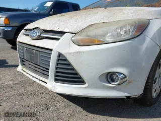 2012 Ford Focus SE with VIN 1FAHP3K23CL251716, listed as a IAAI auction lot 42036099 with 119,600 mi miles. Bid and sale history available at carsss.com. Image 6.