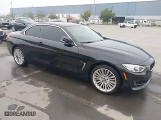 2015 BMW 4 Series 435i xDrive with VIN WBA3T7C51F5A36764, listed as a IAAI auction lot 41658047 with 97,935 mi miles. Bid and sale history available at carsss.com. Image 1.