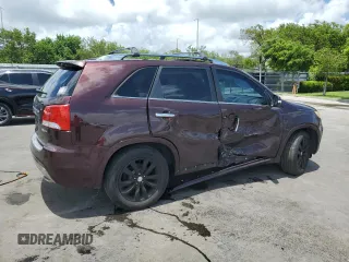 2012 Kia Sorento SX with VIN 5XYKW4A29CG308152, listed as a Copart auction lot 64895355 with 126,816 mi miles and Salvage title. Bid and sale history available at DreamBid. Image 3.