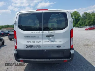 2021 Ford Transit Cargo with VIN 1FTYE1Y82MKA02296, listed as a IAAI auction lot 42377720 with 50,942 mi miles and . Bid and sale history available at DreamBid. Image 16.