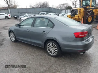 2015 Volkswagen Jetta SE with VIN 3VWD07AJ4FM306977, listed as a IAAI auction lot 41719328 with 105,680 mi miles and . Bid and sale history available at DreamBid. Image 3.