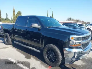 2017 Chevrolet Silverado 1500 LT with VIN 3GCPCREC5HG471758, listed as a IAAI auction lot 41991708 with 77,056 mi miles. Bid and sale history available at carsss.com. Image 13.