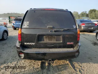 2004 GMC Envoy SLT with VIN 1GKDT13S942407244, listed as a Copart auction lot 70995064 with 162,676 mi miles and Salvage Title. Bid and sale history available at carsss.com. Image 6.