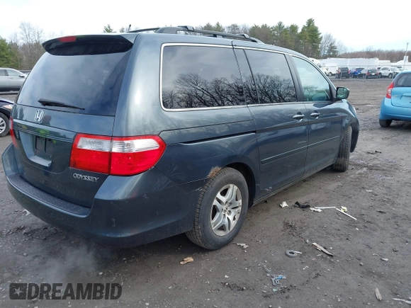 2005 Honda Odyssey EX-L with VIN 5FNRL38645B008281, listed as a IAAI auction lot 41985052 with 219,693 mi miles. Bid and sale history available at carsss.com. Image 4.