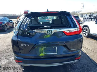 2019 Honda CR-V Touring with VIN 2HKRW1H96KH505447, listed as a IAAI auction lot 41876110 with 56,104 mi miles. Bid and sale history available at carsss.com. Image 16.