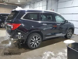 2021 Honda Pilot Elite with VIN 5FNYF6H05MB005324, listed as a Copart auction lot 82866734 with 126,630 mi miles and Salvage Title. Bid and sale history available at DreamBid. Image 3.