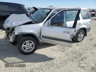 2000 Honda CR-V EX with VIN JHLRD1863YC002722, listed as a Copart auction lot 77416684 with 260,216 mi miles and Salvage Title. Bid and sale history available at carsss.com. Image 1.