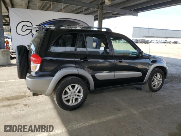 2003 Toyota RAV4 with VIN JTEGH20V030098882, listed as a Copart auction lot 54357825 with 208,991 mi miles and Salvage Title. Bid and sale history available at DreamBid. Image 3.