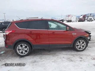 2014 Ford Escape Titanium with VIN 1FMCU9J94EUA13509, listed as a IAAI auction lot 41291232 with 174,303 mi miles. Bid and sale history available at carsss.com. Image 14.