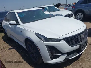 2021 Cadillac CT5 V-Series with VIN 1G6DV5RW2M0128157, listed as a IAAI auction lot 41928263 with 49,698 mi miles and . Bid and sale history available at DreamBid. Image 1.