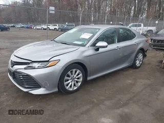 2019 Toyota Camry LE z VIN 4T1B11HK9KU851075, wystawiony jako IAAI lot #41911090 z przebiegiem 114 762 mil mil oraz . Historia ofert i sprzedaży dostępna na DreamBid. Obrazek 17.
