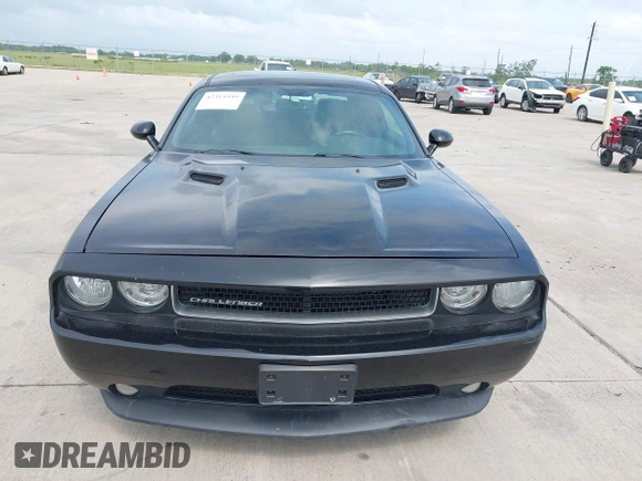 2012 Dodge Challenger SXT Plus z VIN 2C3CDYAG2CH281069, wystawiony jako IAAI lot #42314949 z przebiegiem 167 592 mil mil oraz . Historia ofert i sprzedaży dostępna na DreamBid. Obrazek 6.