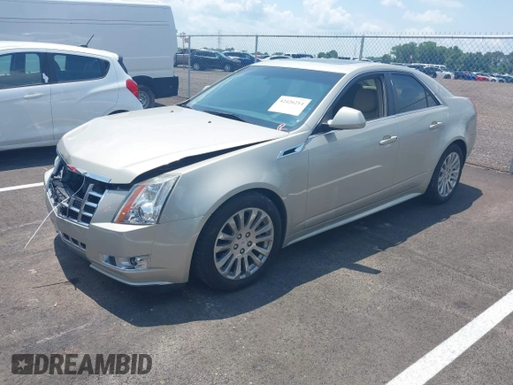 2013 Cadillac CTS Performance with VIN 1G6DK5E31D0146699, listed as a IAAI auction lot 42426214 with 96,520 mi miles and . Bid and sale history available at DreamBid. Image 2.