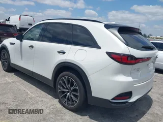 2025 Mazda CX-70 Premium Plus z VIN JM3KJEHA6S1103427, wystawiony jako IAAI lot #42108563 z przebiegiem 3741 mil mil oraz . Historia ofert i sprzedaży dostępna na DreamBid. Obrazek 3.