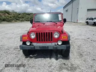 2003 Jeep Wrangler Sport with VIN 1J4FA49S83P369892, listed as a Copart auction lot 56536745 with 182,535 mi miles and Salvage title. Bid and sale history available at DreamBid. Image 14.