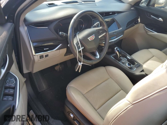 2021 Cadillac XT4 FWD Premium Luxury z VIN 1GYFZCR48MF056210, wystawiony jako Copart lot #73706384 z przebiegiem Nie podano mil oraz Nie do naprawy • Non repairable. Historia ofert i sprzedaży dostępna na DreamBid. Obrazek 8.