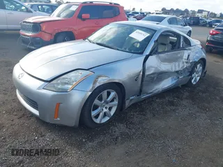 2004 Nissan 350Z Touring with VIN JN1AZ34E94T052137, listed as a IAAI auction lot 41939712 with 93,426 mi miles. Bid and sale history available at carsss.com. Image 2.