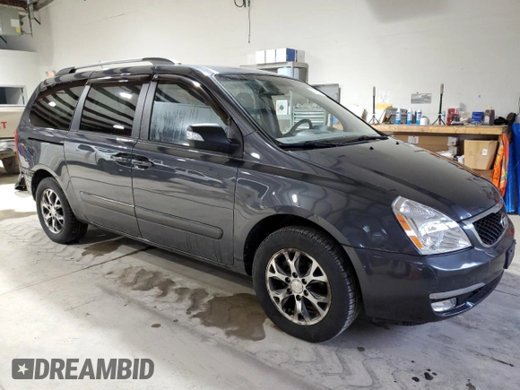 2014 Kia Sedona LX with VIN KNDMG4C77E6541368, listed as a Copart auction lot 52749305 with 130,253 mi miles and Salvage Title. Bid and sale history available at carsss.com. Image 4.