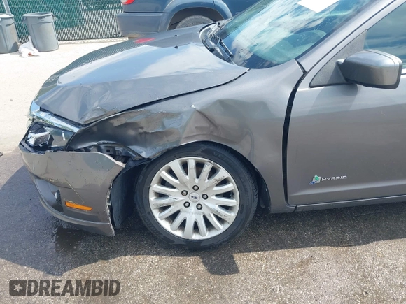 2011 Ford Fusion Hybrid with VIN 3FADP0L32BR132155, listed as a IAAI auction lot 42196233 with 77,900 mi miles and . Bid and sale history available at DreamBid. Image 6.