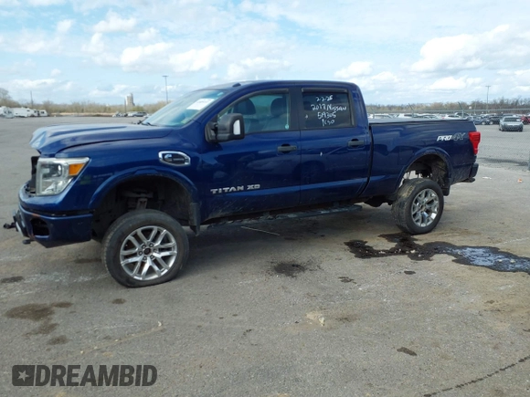 2017 Nissan Titan Pro-4X z VIN 1N6BA1F45HN519305, wystawiony jako IAAI lot #41689197 z przebiegiem 116 562 mil mil oraz . Historia ofert i sprzedaży dostępna na DreamBid. Obrazek 14.