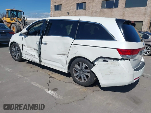 2015 Honda Odyssey Touring Elite with VIN 5FNRL5H91FB038099, listed as a IAAI auction lot 41829649 with 167,017 mi miles and . Bid and sale history available at DreamBid. Image 3.