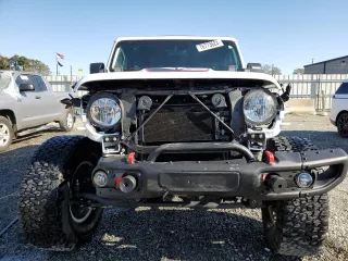 2022 Jeep Wrangler Unlimited Rubicon with VIN 1C4JJXFG2NW125360, listed as a Copart auction lot 76773624 with 22,978 mi miles and Salvage title. Bid and sale history available at DreamBid. Image 5.