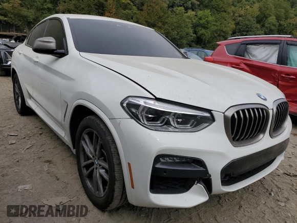 2020 BMW X4 M40i z VIN 5UX2V5C04L9C56582, wystawiony jako Copart lot #72743394 z przebiegiem 44 351 mil mil oraz Nie do naprawy • Non repairable. Historia ofert i sprzedaży dostępna na DreamBid. Obrazek 4.
