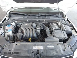 2015 Volkswagen Jetta Sedan 2.0L S with VIN 3VW2K7AJ3FM253125, listed as a IAAI auction lot 41535632 with 103,953 mi miles. Bid and sale history available at carsss.com. Image 10.