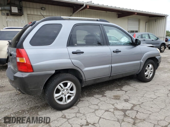 2005 Kia Sportage LX with VIN KNDJF723057062113, listed as a Copart auction lot 66630164 with 129,715 mi miles and Salvage Title. Bid and sale history available at carsss.com. Image 3.