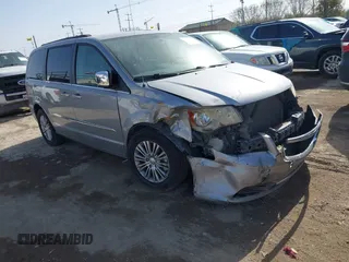 2014 Chrysler Town & Country Touring L 30th Anniversary z VIN 2C4RC1CG8ER192407, wystawiony jako IAAI lot #41666520 z przebiegiem 186 410 mil mil oraz . Historia ofert i sprzedaży dostępna na DreamBid. Obrazek 1.