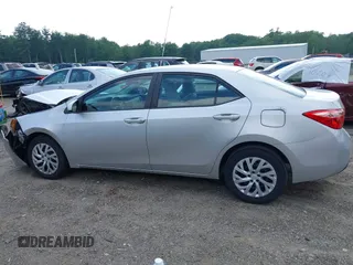 2018 Toyota Corolla L with VIN 2T1BURHE7JC038172, listed as a IAAI auction lot 42473864 with 83,657 mi miles and . Bid and sale history available at DreamBid. Image 14.