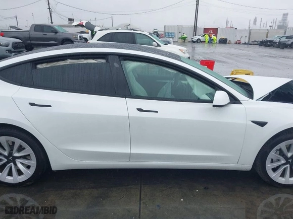 2023 Tesla Model 3 with VIN 5YJ3E1EA1PF426684, listed as a IAAI auction lot 41507661 with 28,703 mi miles. Bid and sale history available at carsss.com. Image 12.
