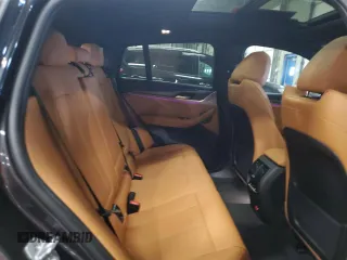 2025 BMW X4 xDrive30i z VIN 5UX33DT09S9Z17216, wystawiony jako Copart lot #55650105 z przebiegiem 1 214 mil mil oraz Szkoda całkowita • Salvage title. Historia ofert i sprzedaży dostępna na DreamBid. Obrazek 11.