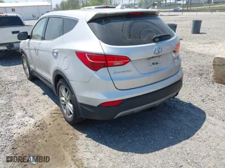 2013 Hyundai Santa Fe 2.0T Sport with VIN 5XYZWDLAXDG057954, listed as a IAAI auction lot 42082667 with 186,678 mi miles. Bid and sale history available at carsss.com. Image 3.
