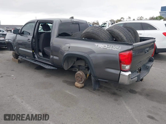 2017 Toyota Tacoma SR5 with VIN 3TMDZ5BN1HM021526, listed as a IAAI auction lot 42204091 with 82,802 mi miles and . Bid and sale history available at DreamBid. Image 3.