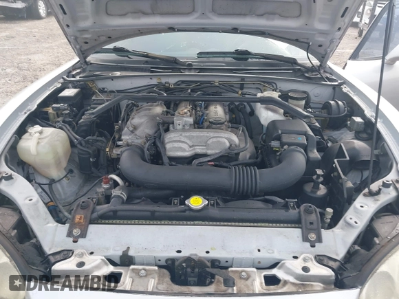 2003 Mazda MX-5 Miata Cloth with VIN JM1NB353730311899, listed as a IAAI auction lot 41929811 with 99,589 mi miles and . Bid and sale history available at DreamBid. Image 10.