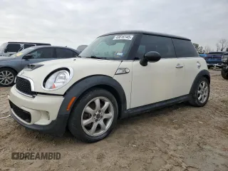 2010 MINI Hardtop S with VIN WMWMF7C55ATW89692, listed as a Copart auction lot 43816145 with 69,223 mi miles and Salvage Title. Bid and sale history available at DreamBid. Image 1.