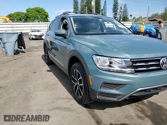 2021 Volkswagen Tiguan SE z VIN 3VV3B7AX6MM041166, wystawiony jako Copart lot #57769445 z przebiegiem 51 030 mil mil oraz Nie do naprawy • Non repairable. Historia ofert i sprzedaży dostępna na DreamBid. Obrazek 14.