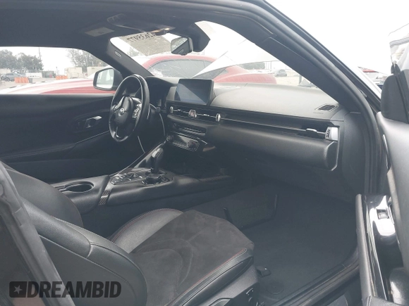 2021 Toyota Supra 2.0 with VIN WZ1DB2C07MW042723, listed as a IAAI auction lot 42635977 with 54,011 mi miles and . Bid and sale history available at DreamBid. Image 5.
