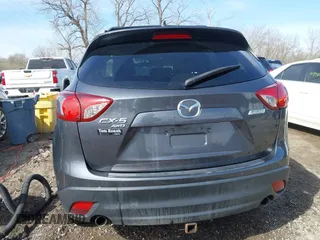 2016 Mazda CX-5 Touring with VIN JM3KE4CY9G0915305, listed as a IAAI auction lot 41840519 with 188,702 mi miles and . Bid and sale history available at carsss.com. Image 16.