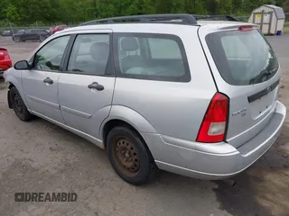 2006 Ford Focus SE z VIN 1FAFP36NX6W214578, wystawiony jako IAAI lot #42316813 z przebiegiem 127 331 mil mil oraz . Historia ofert i sprzedaży dostępna na DreamBid. Obrazek 3.