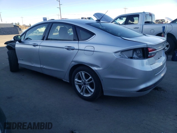 2018 Ford Fusion Hybrid SE with VIN 3FA6P0LU0JR235039, listed as a Copart auction lot 40103613 with 83,129 mi miles. Bid and sale history available at carsss.com. Image 2.