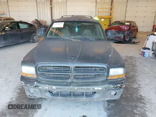2000 Dodge Durango with VIN 1B4HS28N7YS306577, listed as a IAAI auction lot 42208829 with 206,865 mi miles and . Bid and sale history available at carsss.com. Image 6.
